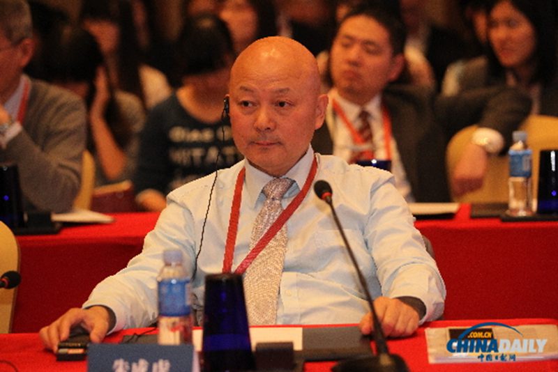 朱成虎将军在论坛上。摄影:中国日报 邹红 朱成虎将军在论坛上。摄影:中国日报 邹红